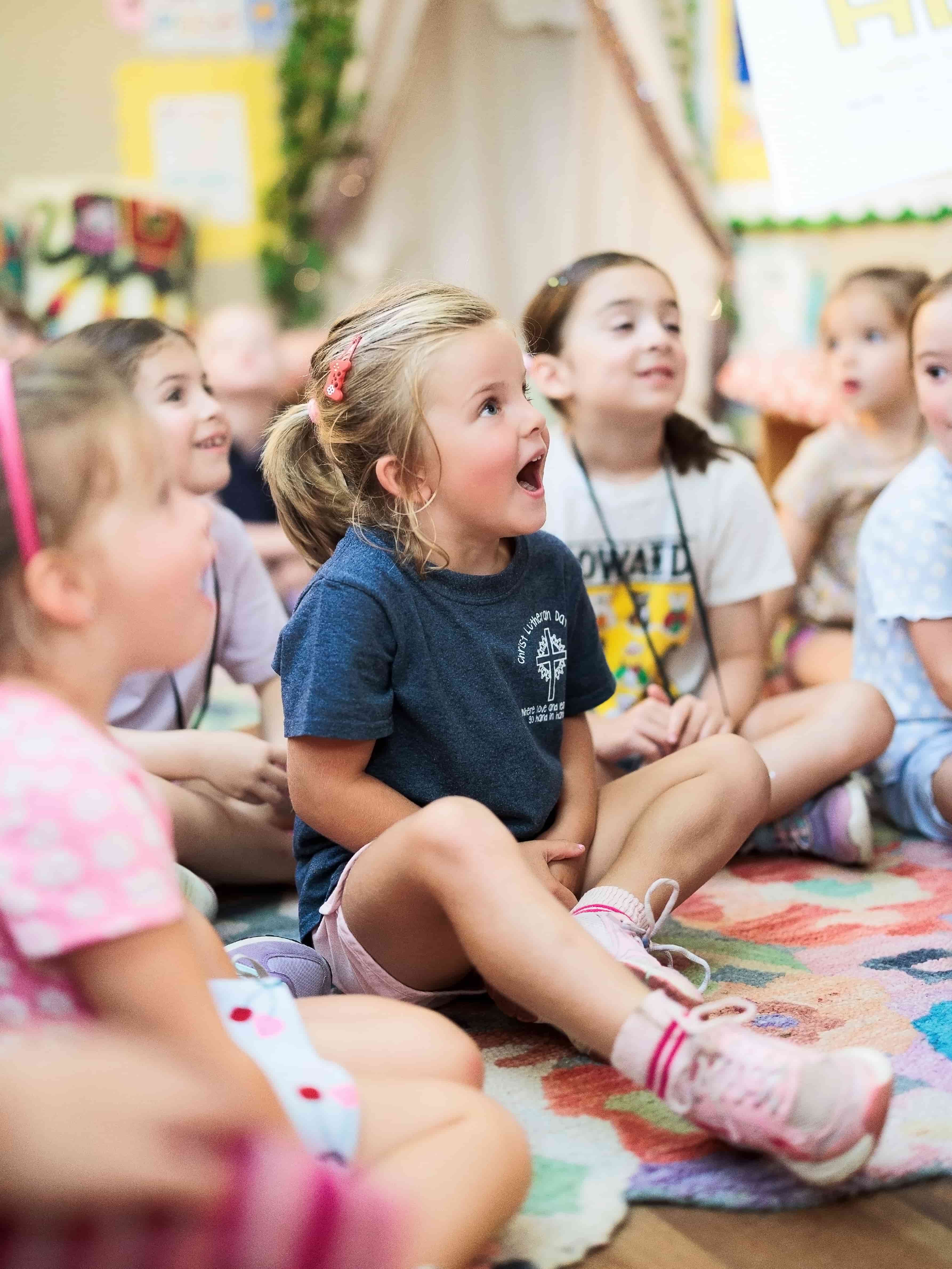 A young artist filled with wonder during a Storybook Studio story time